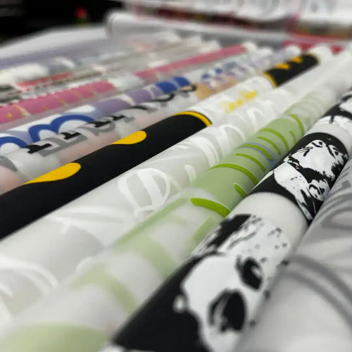 Rolls of patterned wrapping paper.