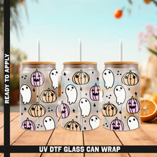 Load image into Gallery viewer, a group of halloween themed tumblers sitting on top of a wooden table
