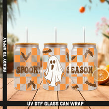 Load image into Gallery viewer, a group of halloween cans with a ghost on them
