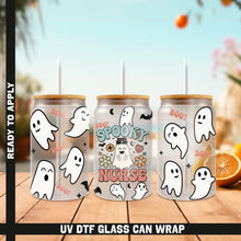 Load image into Gallery viewer, a group of three halloween cans sitting on top of a wooden table
