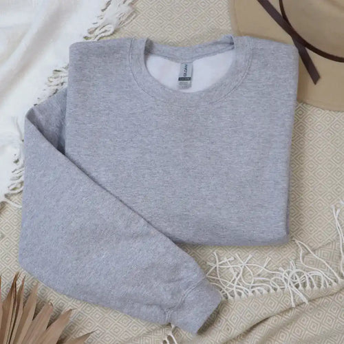 Heather grey crewneck sweatshirt.