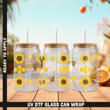 Load image into Gallery viewer, three sunflowers and a bee on a glass can wrapper
