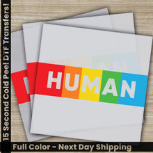 Load image into Gallery viewer, a close up of a piece of paper with the word human on it
