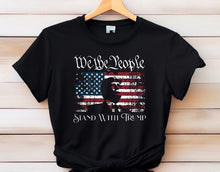 Load image into Gallery viewer, a black t - shirt with the words we are people and an american flag
