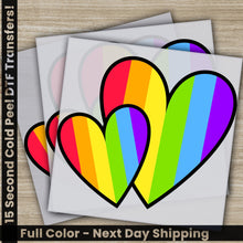 Load image into Gallery viewer, a pair of heart shaped stickers on top of a piece of paper
