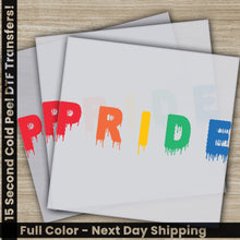 Load image into Gallery viewer, a pile of white paper with the word pride painted on it
