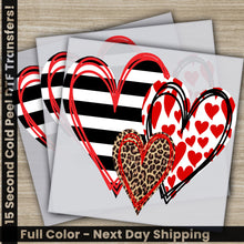 Load image into Gallery viewer, a set of four valentine&#39;s day cards with hearts
