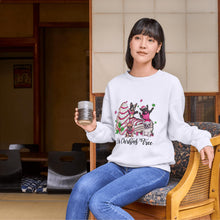 Load image into Gallery viewer, a woman sitting on a chair holding a glass of wine
