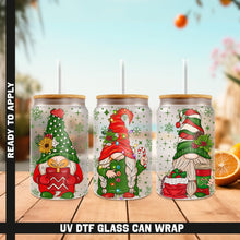 Load image into Gallery viewer, a set of three christmas themed glasses on a table
