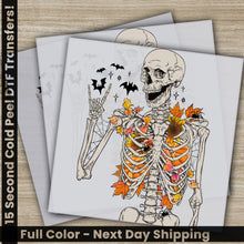 Load image into Gallery viewer, three halloween coloring pages with a skeleton holding a pumpkin
