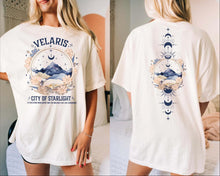 Load image into Gallery viewer, a woman wearing a white shirt with a picture of a mountain on it
