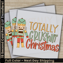 Load image into Gallery viewer, a christmas card with two nutcrackers on it