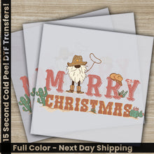 Load image into Gallery viewer, a christmas card with a cowboy holding a hot dog