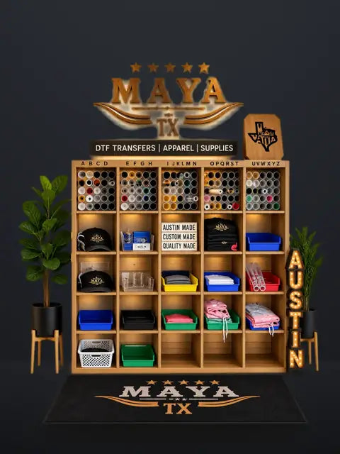 MAYA TX order pickup shelves sorted A to Z with rolled DTF transfers, caps and apparel